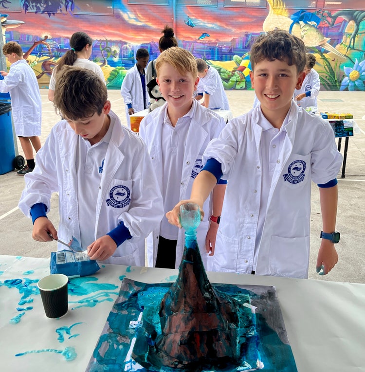 Three students conducting a science experiment